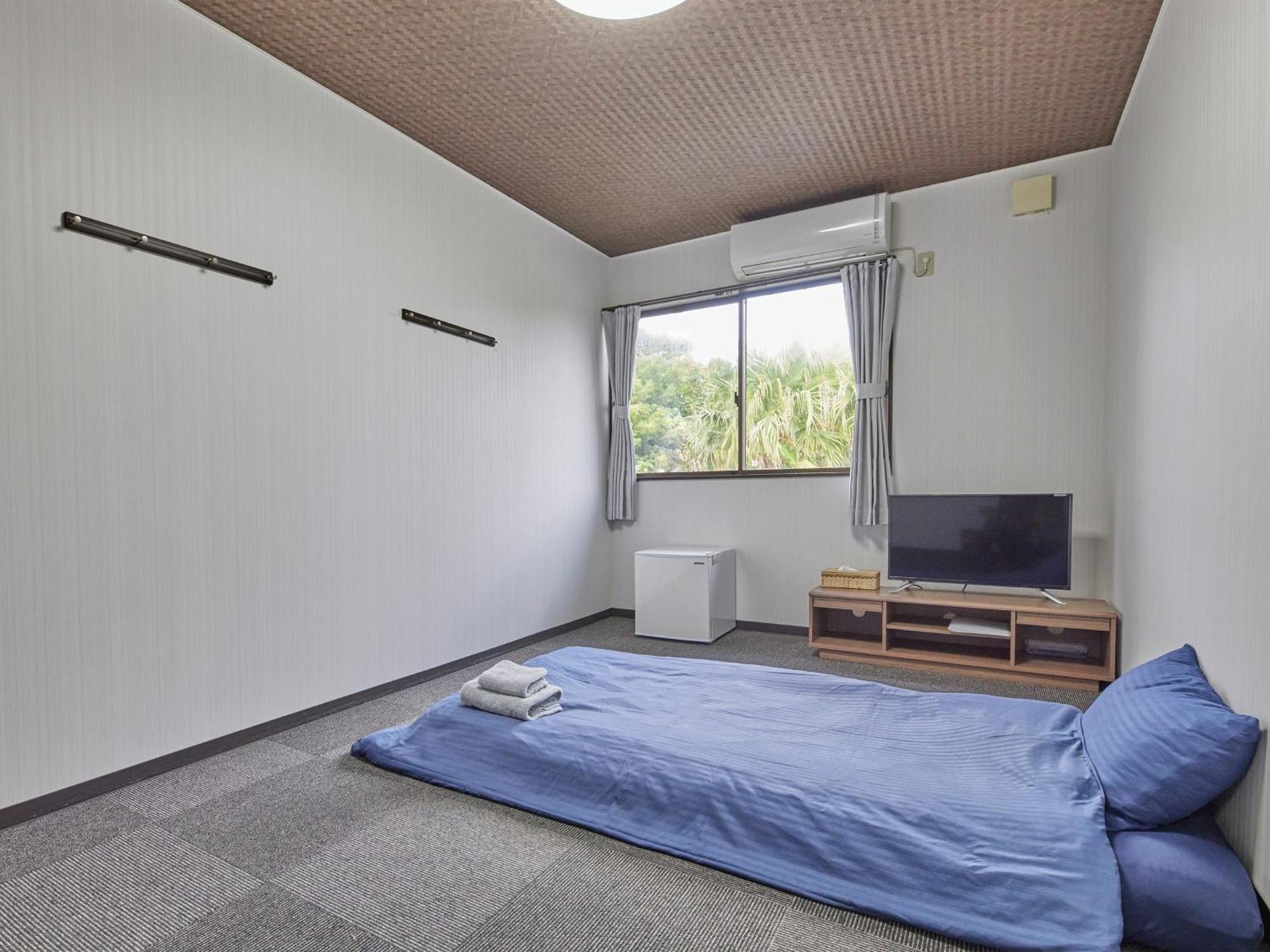 Guesthouse Ama Terrace Amami Exterior foto